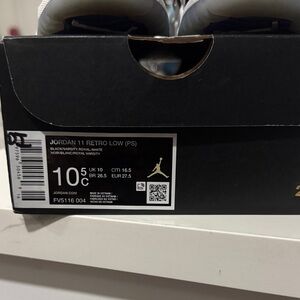 Jordan 11 Retro Low PS in Black and White